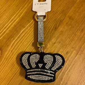 Black crown bag tag with crystal rhinestones on a gold tone ring 5 1/2 “